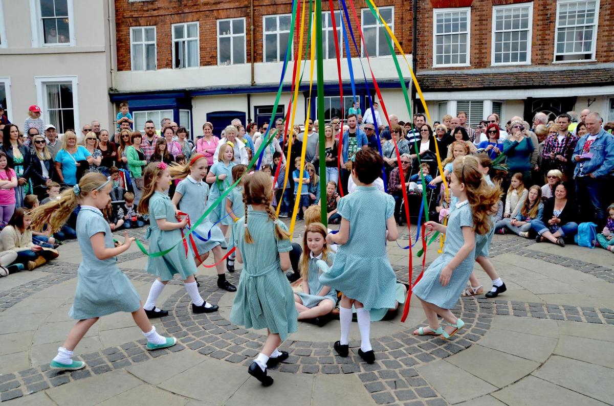 Maypole dancing with the children from St Anne's Primary School. PIC: Colin Hill