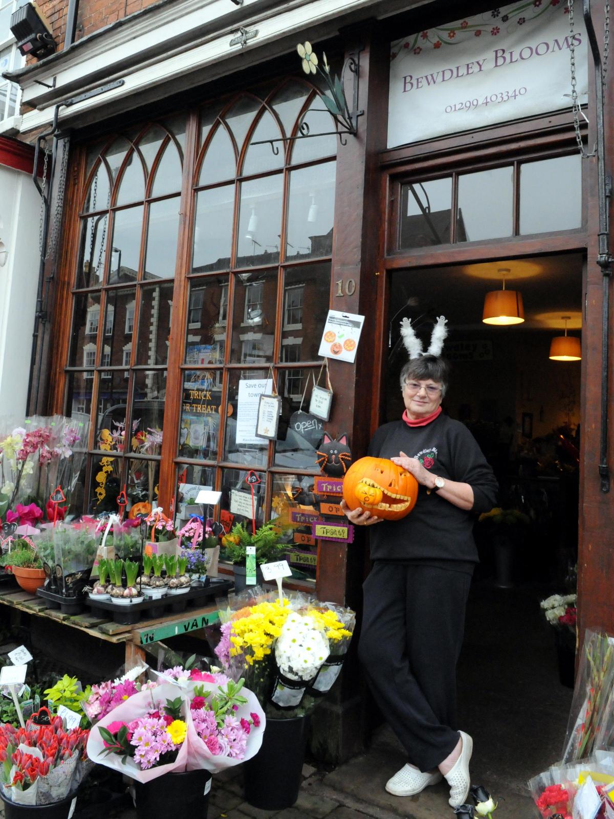 Jo Latimer from Bewdley Blooms, with their pumpkin window display
