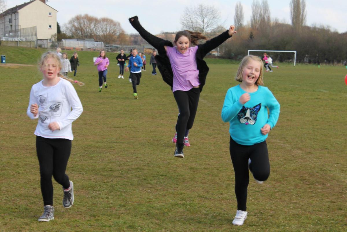 Children from Comberton Primary School, in Borrington Road, enjoy running a mile for Sport Relief