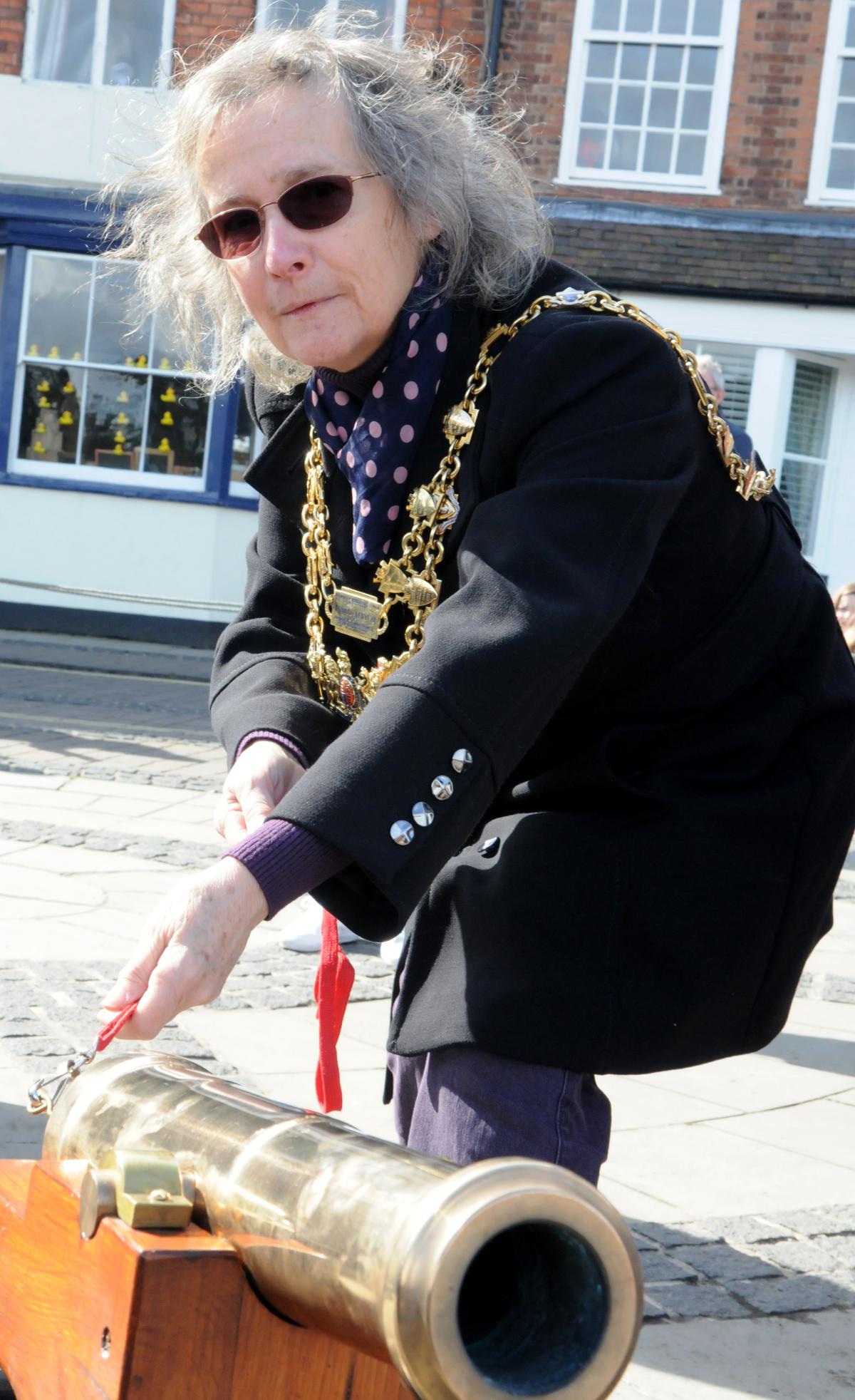 The Mayor of Bewdley, Calne Edginton-White, fires the starting fun for Bewdley Duck Race