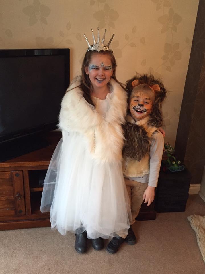 Lottie, 9, and Sam Newnham, 6, from Burlish Park Primary School, as the Snow Queen and Aslan the Lion, from the Lion, the Witch and the Wardrobe