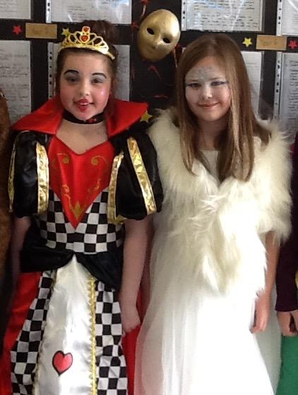 Burlish Park Primary School pupils Edith Troth, 9, and Lottie Newnham, 9, as the Queen of Hearts, and the Snow Queen, from the Lion, the Witch and the Wardrobe