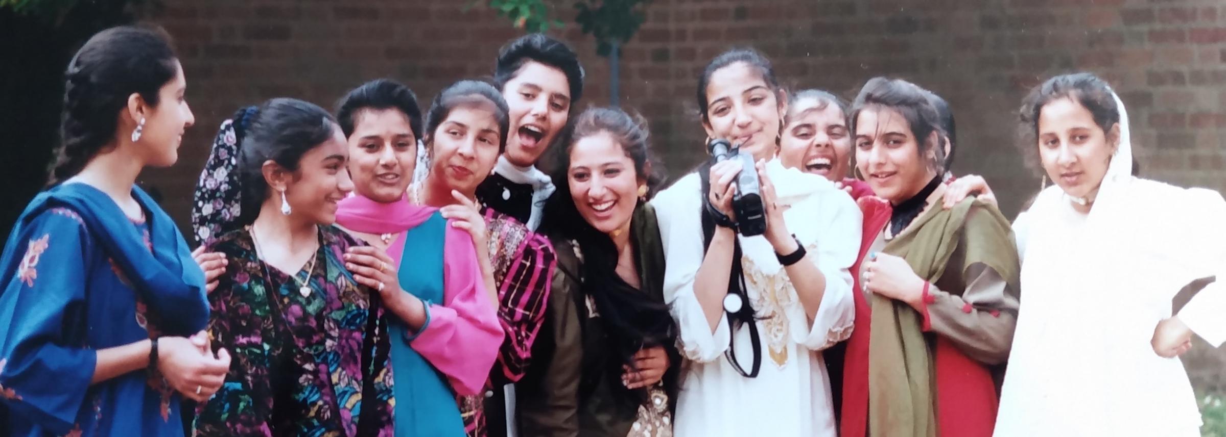 A culture day was held in July 1985, when pupils studied the dress, history and food of different cultures. Anila Parveen is pictured making a video of her friends during the day