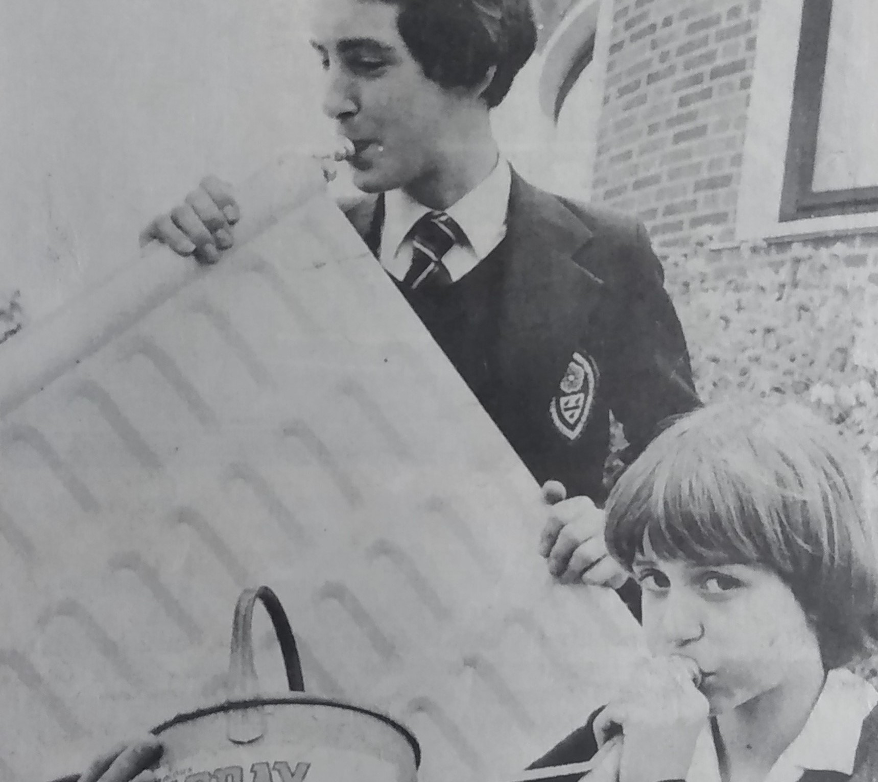 Heavy metal music makers Paul Cerri and Jane Kenny-Smith sorting out items for the school bazaar in July 1981