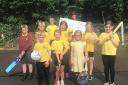 Mel Hall, area fundraiser for Acorns Children’s Hospice, with pupils from Hartlebury CE Primary school