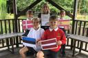 Teacher Lauren Tromans with Year 6 pupils (from left) Faith Wood, Freddie Norman, Rory Evans and Alice Wood