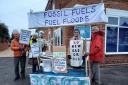 Extinction Rebellion Wyre Forest with 'fossil fuels fuel floods' banner
