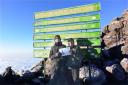 TOP OF THE WORLD: Alex and Chris Jordan at Gilman's Point, 5,800 metres up Mount Kilimanjaro.