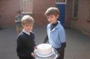 Special cakes: George and Edward Battin with a snowdrop cake.
