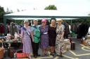 Dolled up: From left, Cora Grove, Kay Mather, Trish Pardoe, Lilian Griffiths and Liz Kilgour in the vintage attire.