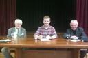 Euro arguments: From left, Michael Clark, Tom Cadwallader, and Lawrence Brewer at the debate.