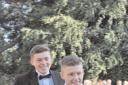 DEVASTATED: Oliver Green, front, rocks up with a friend to his high school prom last year on the quad bike, which has been stolen.