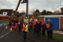Glenda Brown with local residents as pole put up on Stagborough Way