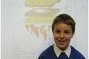 BIG BREAKFAST: Archie Luckett, eight, with his winning design.