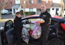 HELP volunteers Jo Ridsdill-Wardle and Dave Griffin with a week's worth of donations