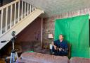Steve Carrigan filming virtual music classes in his living room.