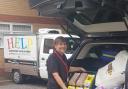 HELP's Jo Ridsdill-Wardle loads food donations for the homeless