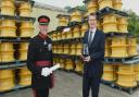 Vice Lord Lieutenant Roger Brunt presents the award to Chris Akers, Managing Director of Titan Steel Wheels