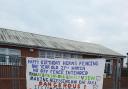 Banner attached to fencing loathed by Hartlebury residents