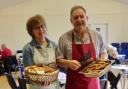 Pam Jarvie and Trefor Cook dishing up at a previous Big Breakfast