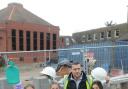 Boarding party: Pupils look ahead to the extension completion.