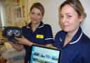 Tammie Mason (left), manager of Ward One at Kidderminster Hospital and ward sister Natalie Plimmer with the VR equipment