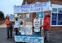 Extinction Rebellion Wyre Forest with 'fossil fuels fuel floods' banner