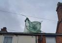 Greenhouse is blown onto roof in Kidderminster