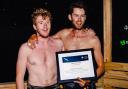 George Farmiloe and Matt Bladen with their certificate. Picture: World's Toughest Row