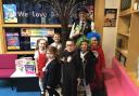 Terry Caffrey with year one pupils from the six SAET primary schools with many dressed as their favourite fictional character