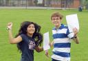 Battle of the sexes: Kim Esquivel and James Martindale celebrate their results at King Charles I School. Picture: JONATHAN HIPKISS. 351313J.
