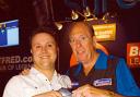 Wayne Rudge, of Tenbury Wells, received the signed shirt from former world champion John Lowe.