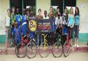 Children receiving bikes from Joel Rider in Africa