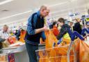 Brilliant result: Michael Surridge and son, Alex, 10, during the bag-packing session at Sainsbury's.