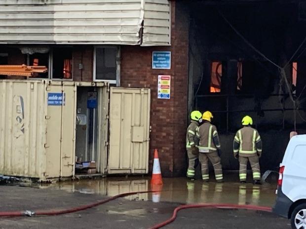 Kidderminster Shuttle: Firefighters at the building on Hoo Farm Industrial Estate this morning. Picture: HWfire
