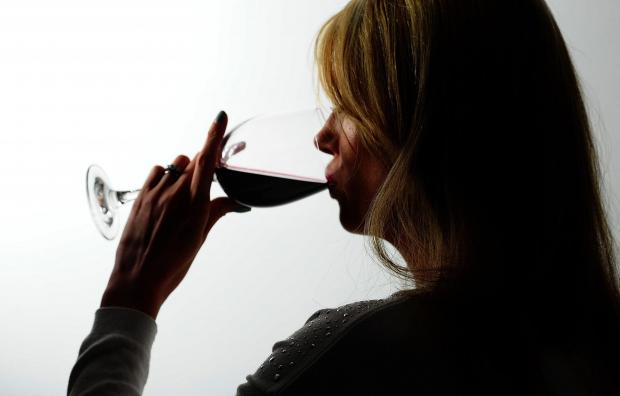 Kidderminster Shuttle: A woman drinking red wine. Credit: PA