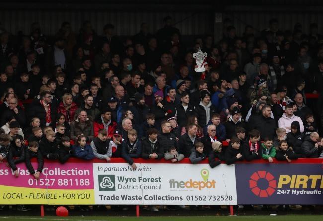 Kidderminster Harriers fans in the stands during the Emirates FA Cup third round match at the Aggborough Stadium, Kidderminster. Picture date: Saturday January 8, 2022. Photo: PA