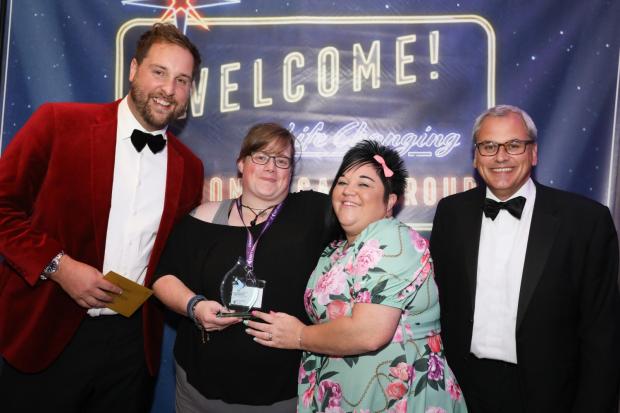 Jodie Richards (second from left) accepts Support Worker of the Year Award with sponsor, Luke Osbourne, service manager, Kelly Smith and James Allen, CEO of National Care Group