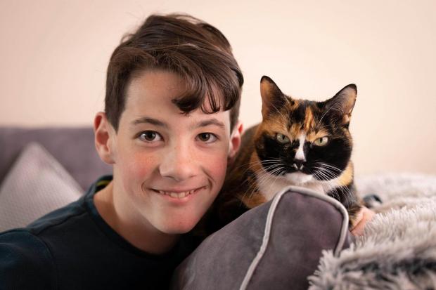 Elliot Abery and his cat Chicken