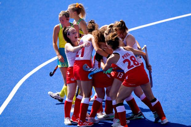 England’s Holly Hunt celebrates with her team-mates after scoring in the final victory over Australia