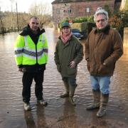 Environment Agency flood risk manager Anthony Perry, Minister for Environment Rebecca Pow and Wyre Forest MP Mark Garnier in Bewdley earlier this month