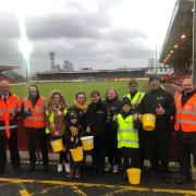 HELP volunteers collected more than £200 at Saturday's Harriers game for The Shuttle Run Appeal