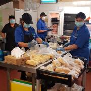 HELP volunteers prepare food parcels for people in need during the coronavirus crisis