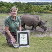 Nicola Anslow, Education Manager at West Midland Safari Park, celebrates winning ‘Best Wildlife 
Attraction’ at the School Travel Awards.