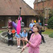 Juggling school: Melanie Perol and pupils of Abberley Hall School.