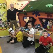 Author Jason Beresford with children from the six SAET primary schools during his session at Stourport Primary Academy