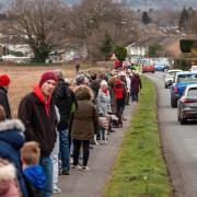 Hundreds of people protested again the homes plan in March this year