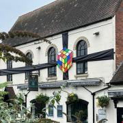 The Black Star pub in Stourport decorated with a huge Rubik's Cube bow