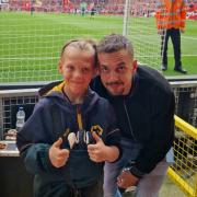 Ross Bennett and his son Tyler at a past away game at Anfield in May 2022
