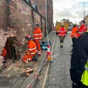There was a hole in the wall after the crash on Mitton Street